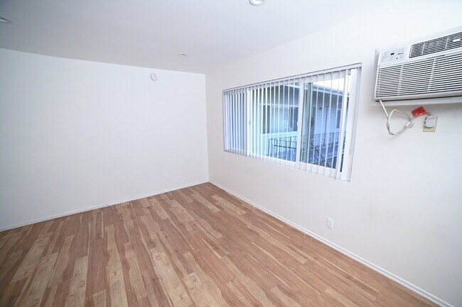 Building Photo - Newly remodeled studio in a gated building with pool and laundry room!