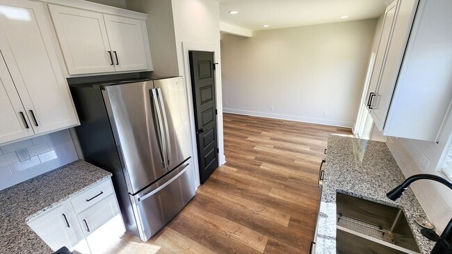 Building Photo - High-End Touches & Flexible Space in a Bea...