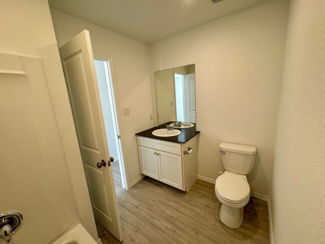 Building Photo - Modern 4-Bedroom Home with Community Pool ...