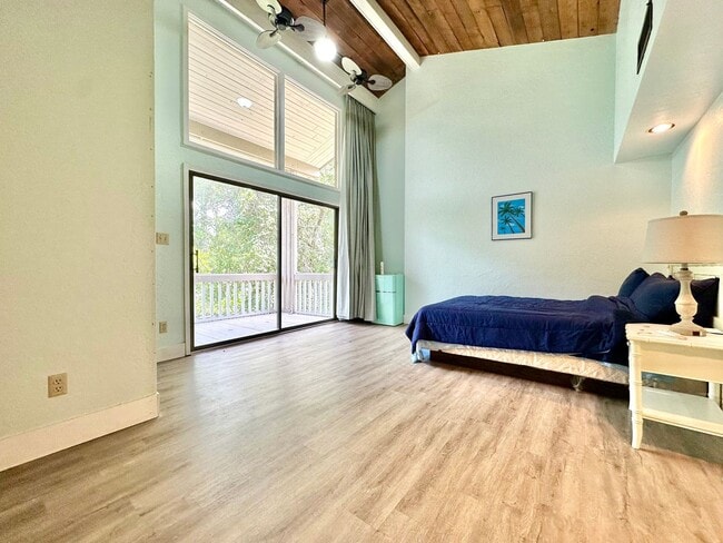 Building Photo - Lofty Vibes & Backyard Views – Your Dream ...