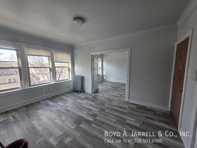 Building Photo - 10855 S Vernon Ave