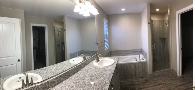 Building Photo - Beautiful 1,735 sq. ft. townhome featuring 3 bedrooms and 2.5 bathrooms!