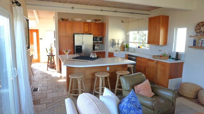 Building Photo - THE BEACH IS YOUR BACKYARD! Light & Bright...