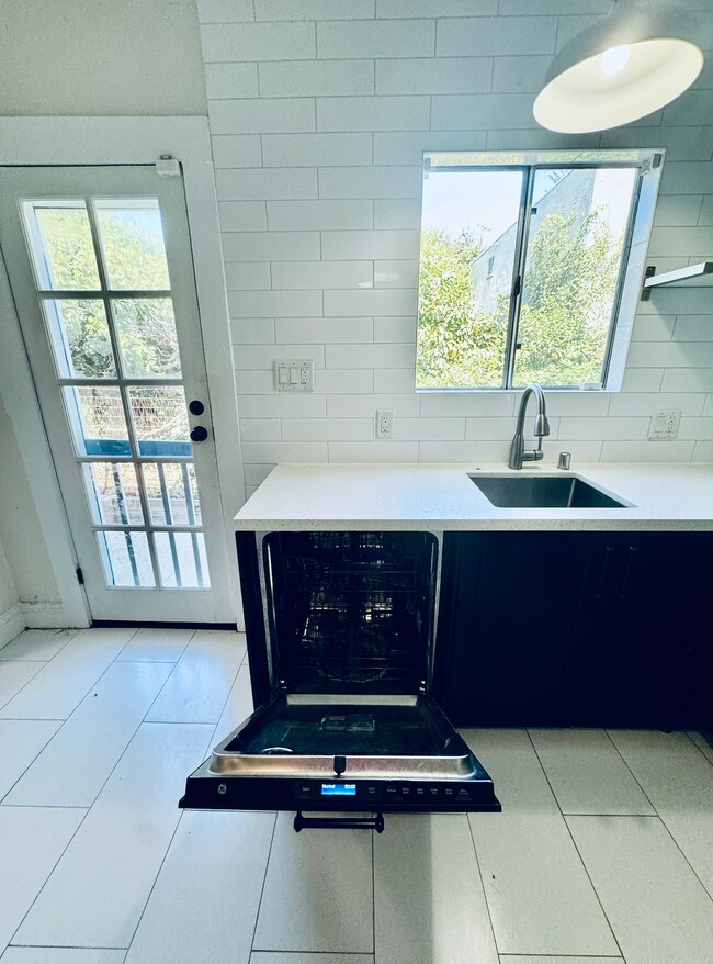 Built in dishwasher. - 1007 S Plymouth Blvd