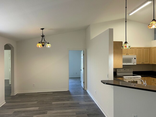 Building Photo - Freshly painted interior and BRAND NEW LVP...