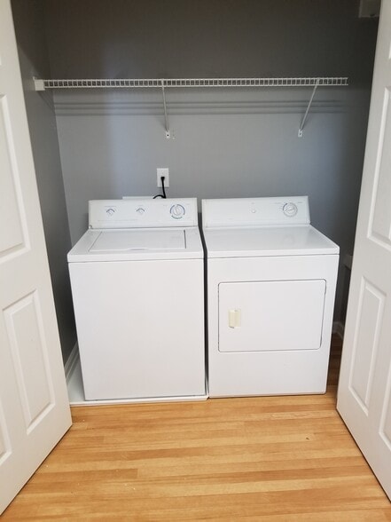 Laundry area off of kitchen on main level - 48 Timber Ridge Dr