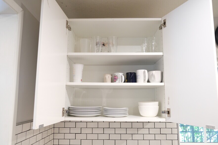 Kitchen cupboard comes with cups, plates, bowls, etc. - 1243 N Alexandria Ave