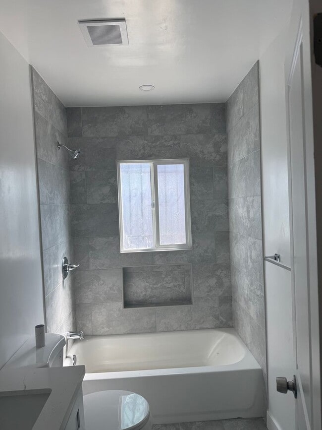 Building Photo - FOR RENT — COMPLETELY REMODELED Apartment