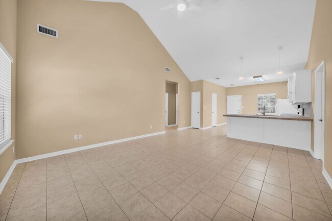 Building Photo - Live just steps from Lake Conroe in this beautifully maintained 3-bedroom, 2-bath home located in...