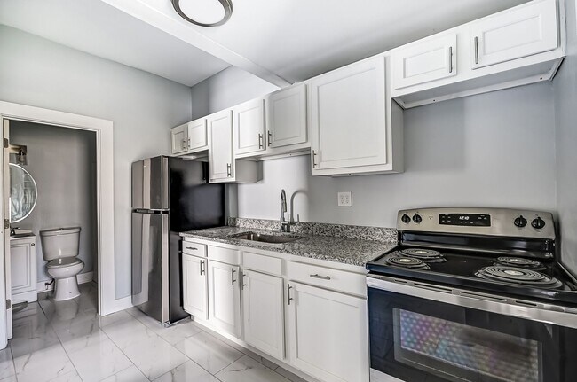 Building Photo - Charming 4 bedroom, 1 bathroom