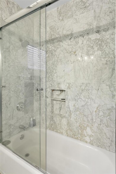 Carrara slab tub with enclosure - 306 3rd St