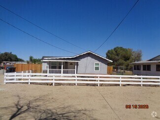 Building Photo - Cute and Cozy Ranch Style Home in East Lan...