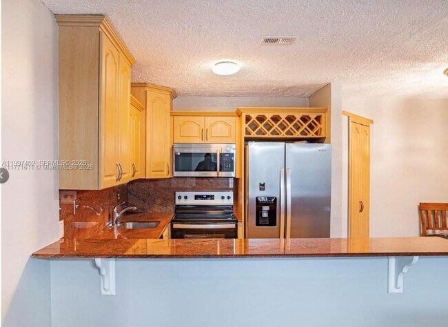 Building Photo - 6545 W 27th Ct