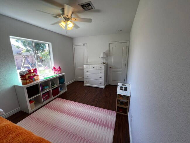 Building Photo - 8443 Forget Me not St