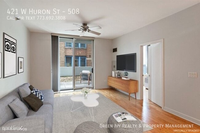 Building Photo - Stunning River North condo with Huge Patio!