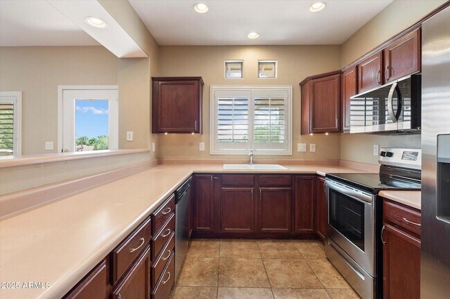 Building Photo - 9100 E Raintree Dr