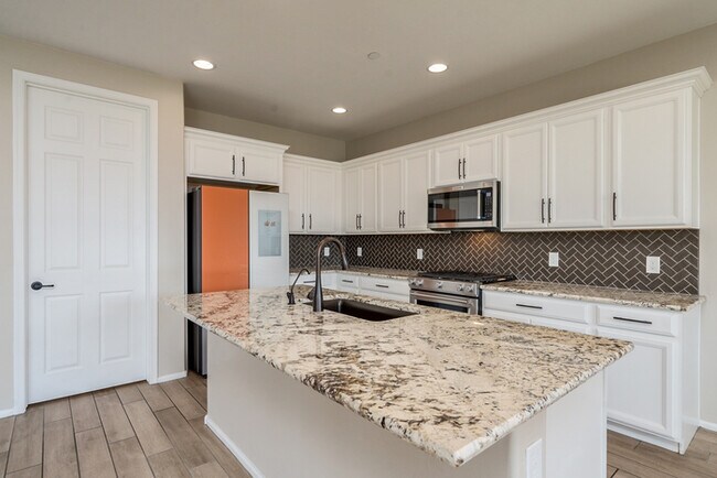 Building Photo - Amazing 4BR 2.5BA Home w/ 3-Car Tandem Garage • Pool Access • Yard w/ Fire Pit in Saguaro Trails