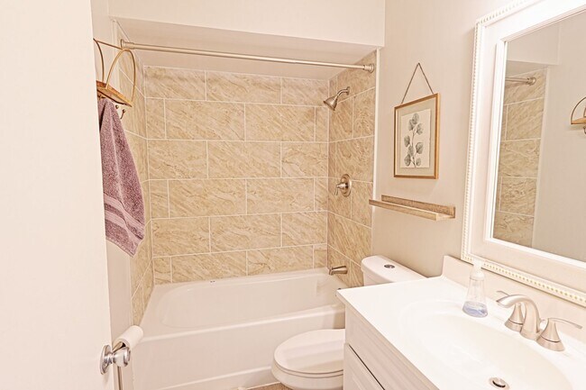 Building Photo - Spacious 3-Bedroom Attached Villa with Finished Basement & Private Fenced Yard!