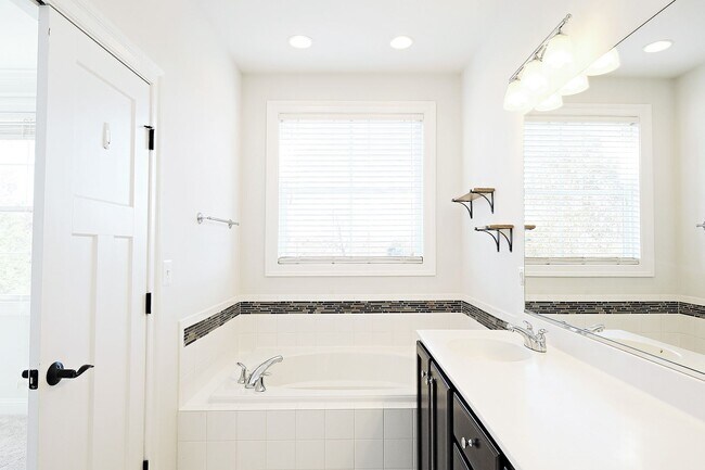 Building Photo - Modern Townhome Living Near Hollymead Town...