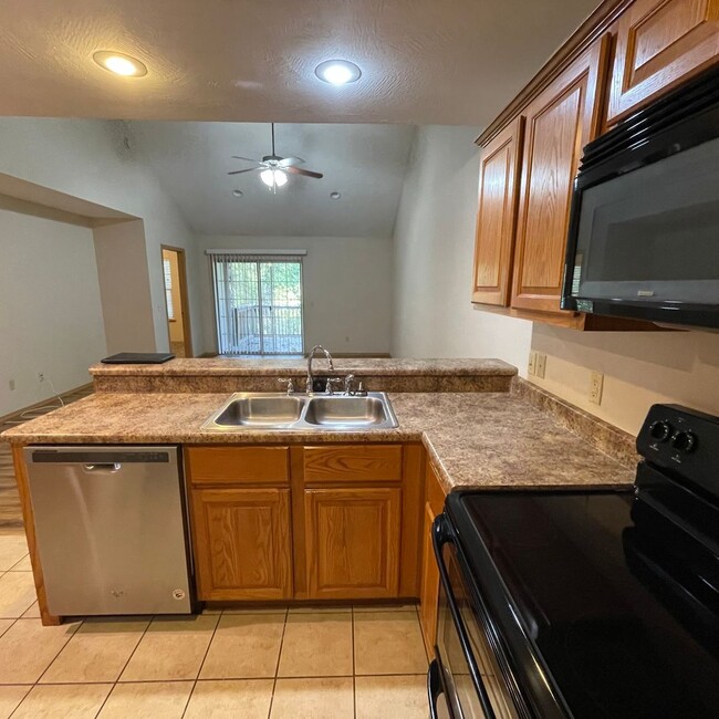 Building Photo - Beautiful 4 bedroom 3 full bathroom Townhome - Owner Special -Move in March and pay no rent until...