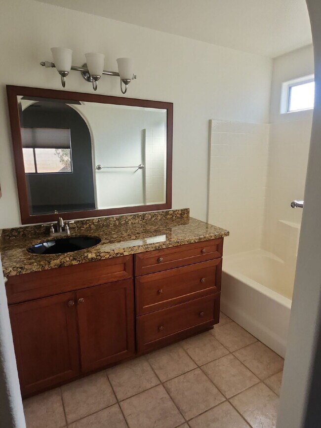 Building Photo - "Charming 3-Bedroom Oasis with 2 Baths in ...