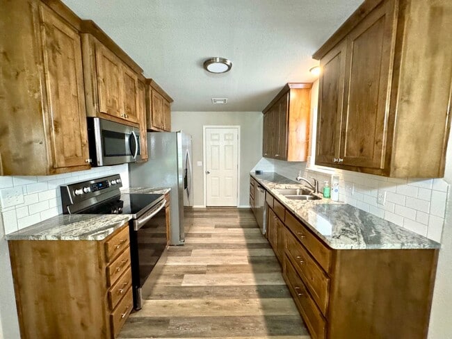 Building Photo - Newly Remodeled Brick Home 3/2 Two Car Garage