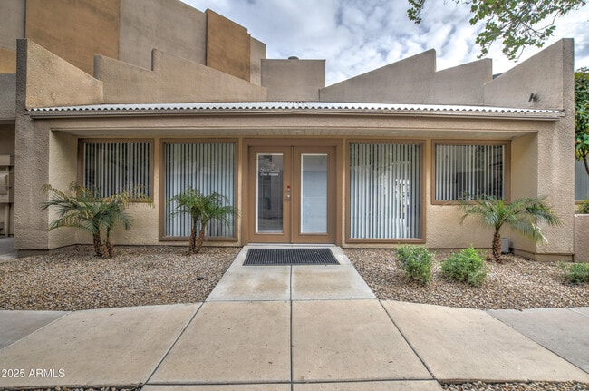 Building Photo - 4850 E Desert Cove Ave