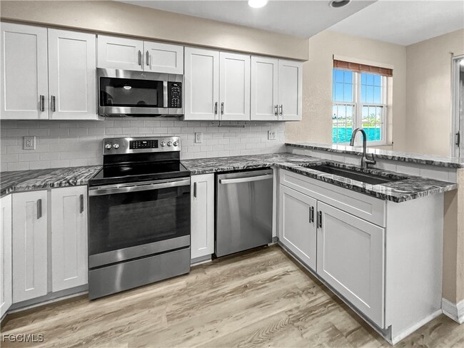 Building Photo - 16285 Coco Hammock Way