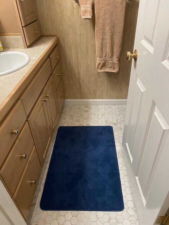 Secondary Bathroom with new tile flooring - 6620 Lake Washington Blvd NE