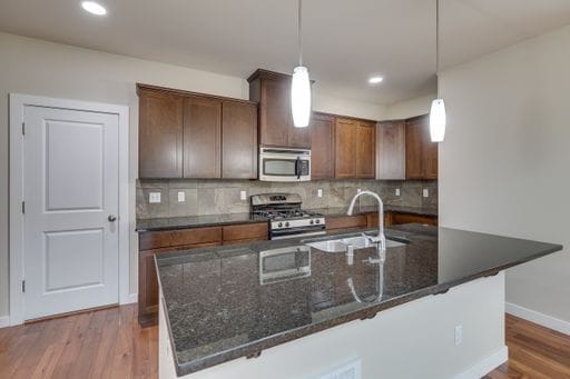 Building Photo - Mill Creek Townhome with 2 Car Garage Available Now!