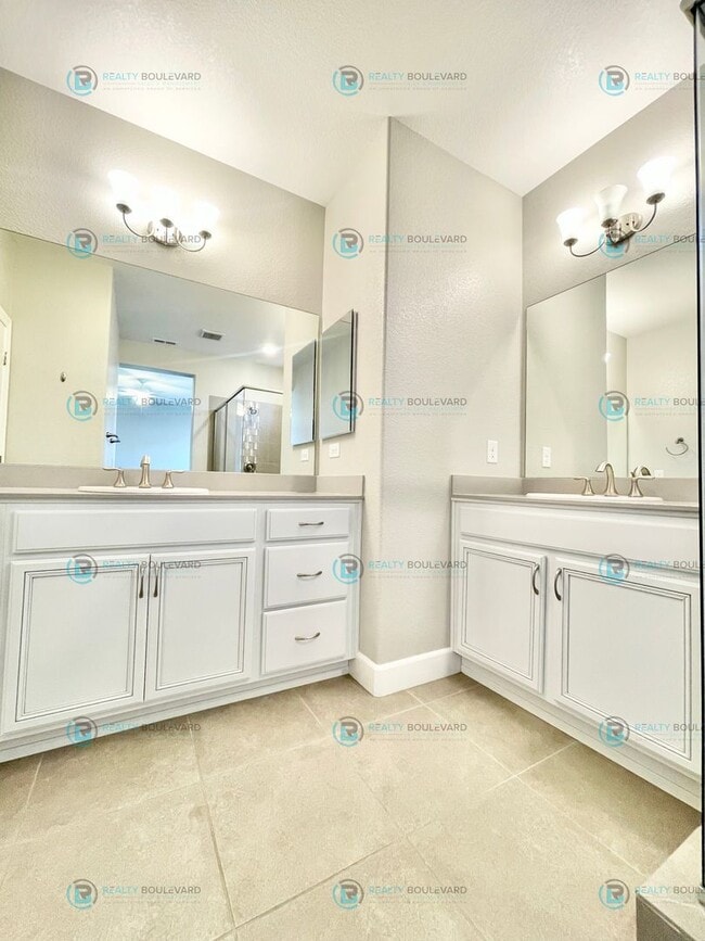 Building Photo - Discover luxurious living in this stunning 3-bedroom, 2-bathroom, 2-story condo, perfectly design...