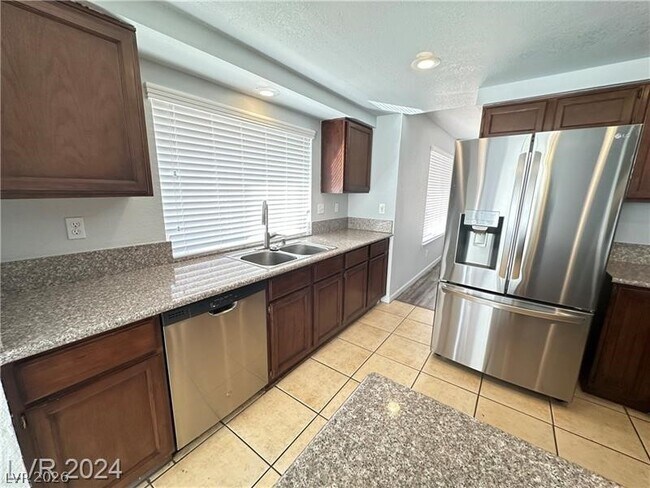 Building Photo - 9253 Magic Flower Ave