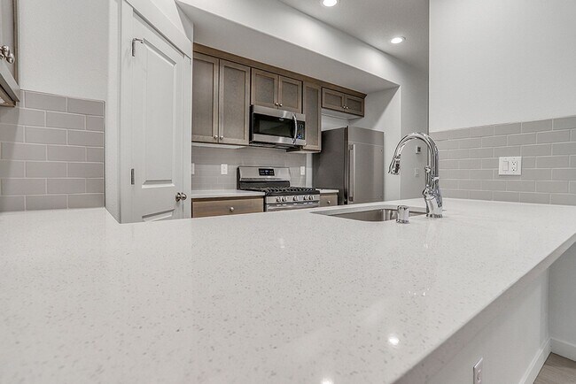 Building Photo - Modern Living in the Heart of Ridgefield: Quartz Finishes & Open-Concept Charm