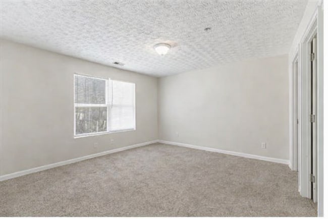 Building Photo - Spacious 2nd Floor Condo in Lithonia, Georgia -- Vouchers Accepted