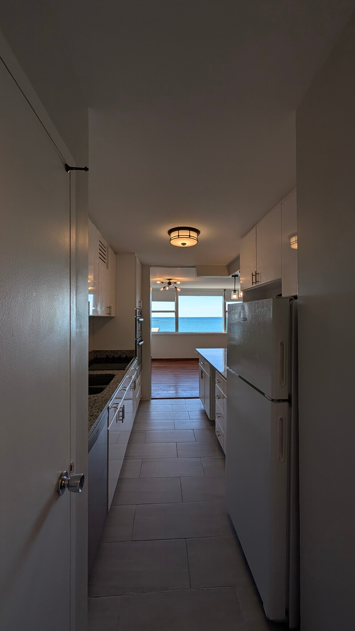 Kitchen and living/dining - 6301 N Sheridan Rd