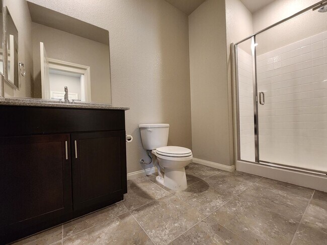 Building Photo - A Fairly New Home with 5 Bedrooms in a gated community
