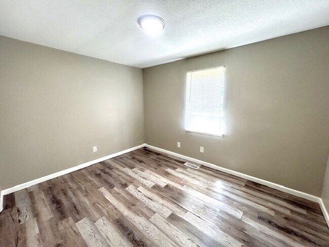 Building Photo - Spacious 4-Bedroom, 2-Bath Home Located in...
