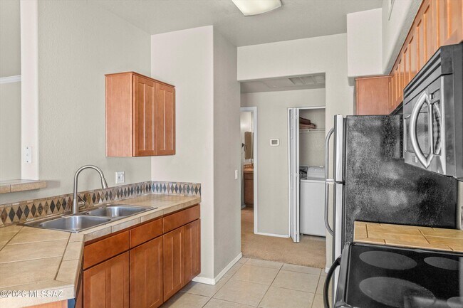 Building Photo - 7050 E Sunrise Dr
