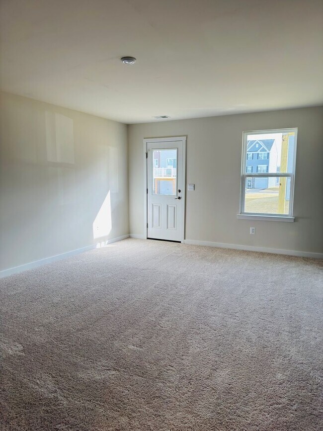 Building Photo - Brand New 4 Bed 3.5 Bath End Unit Townhome in Inwood