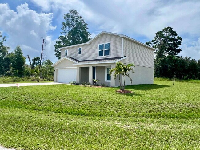 Building Photo - Spacious 4-Bedroom Home with Primary Suite...