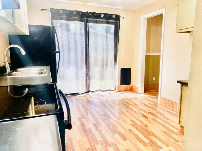 Building Photo - Charming 3BR/1BA w/ 1-car garage, long driveway, fenced yard, wood stove & shed/workshop.