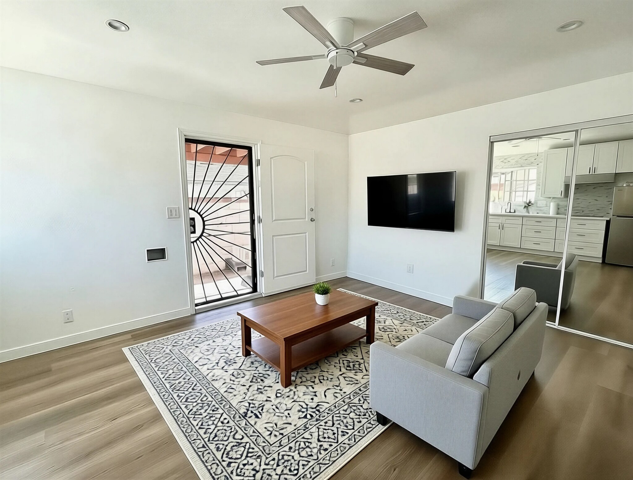 Living room (virtually staged) - 327 W D St