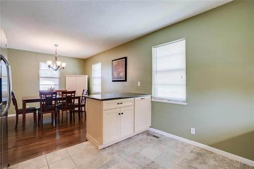 Breakfast bar with storage underneath. - 7416 N. Central St.