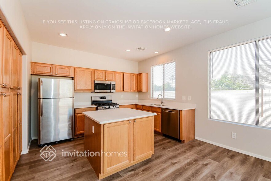 Building Photo - 8704 N 58th Dr