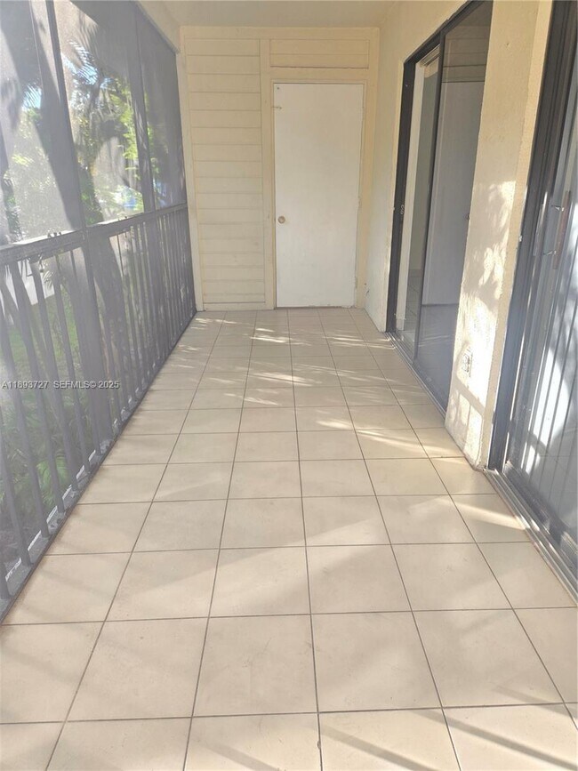 Building Photo - 18875 NW 62nd Ave