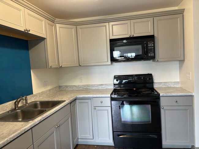 New cabinets counter top & paint - 135 W Miller Ave