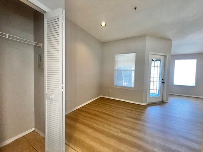 Building Photo - NEW-Remodeled bathroom & kitchen! NEW VINYL PLANK flooring & fresh paint! 2 bedroom 1 bath condo ...