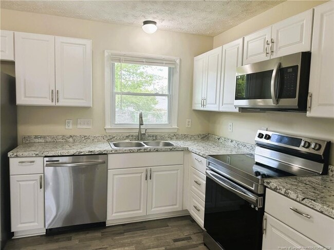 Building Photo - 4938 Tangerine Dr