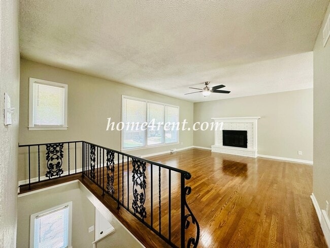 Building Photo - Updated Raytown Ranch w/ Wood Floors, SS Appliances, Finished Basement and a Fenced Yard!