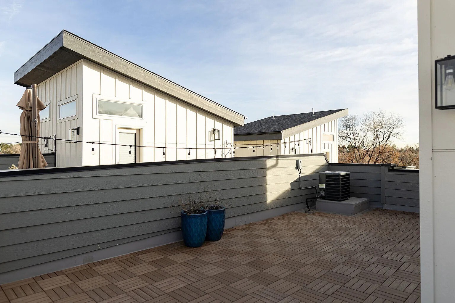 Private rooftop with a view of downtown, DU, mountains, and surrounding areas - 3505 S Marion St